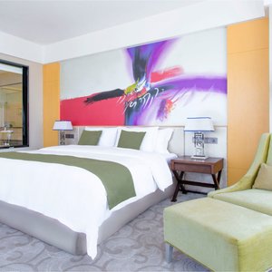 Hotels & Preference Hualing Tbilisi in Tbilisi, image may contain: Furniture, Bed, Bedroom, Indoors