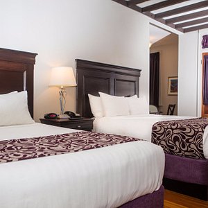 Lamothe House Hotel in New Orleans, image may contain: Bed, Furniture, Cushion, Home Decor