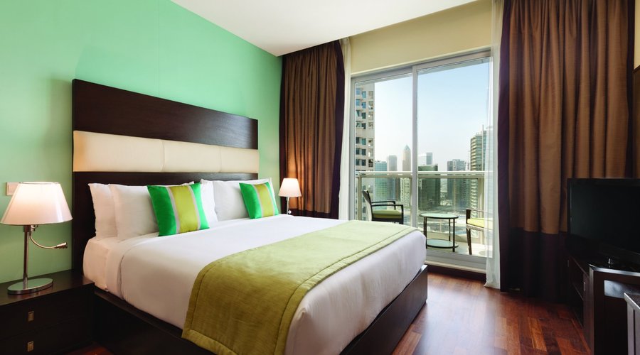 Downtown View: Bedroom with balcony