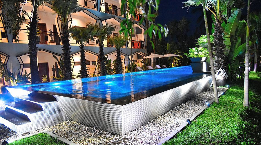 1 of our 2 pools ! Here is our silver-tiled pool