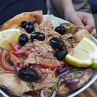 Tuna salad is absolutely HUGE. And it comes with "pita bread"