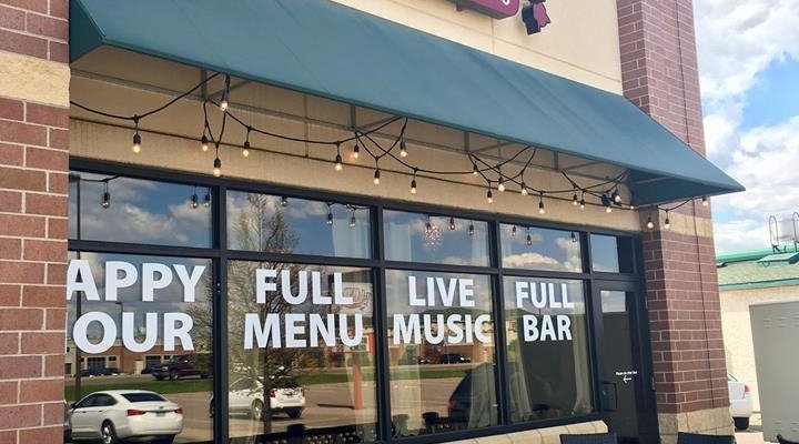 This is our new and improved patio! Come enjoy a glass of wine and soak up some sun!