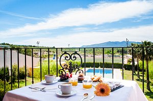 Hotel La Cava in Cabanes, image may contain: Balcony, Building, Coffee Cup, Coffee