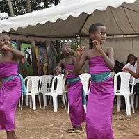 Kids dancing at Mama Rwanda sewing project completion event