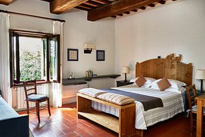 Locanda Rosati in Orvieto, image may contain: Hotel, Resort, Bed, Furniture