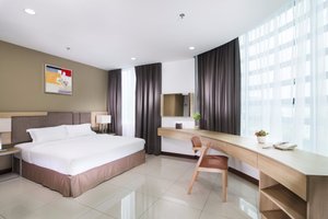 One Pacific Hotel & Serviced Apartment in Penang Island, image may contain: Bed, Furniture, Corner, Home Decor