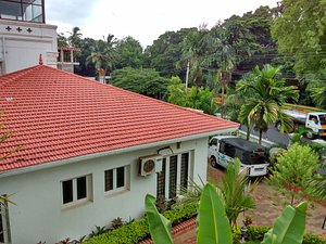 Saaral Resorts in Courtallam, image may contain: Hotel, Resort, Roof, Truck