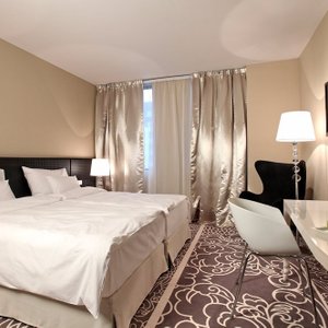 Falkensteiner Hotel Belgrade in Belgrade, image may contain: Home Decor, Corner, Cushion, Furniture