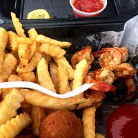 Blackened Shrimp - There's more shrimp under the fries and I'd eaten a few. You get a dozen.