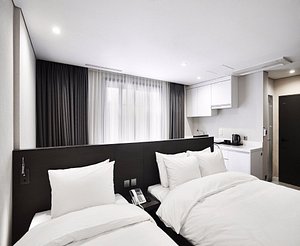 Arban City Hotel in Busan, image may contain: Cushion, Home Decor, Interior Design, Dorm Room