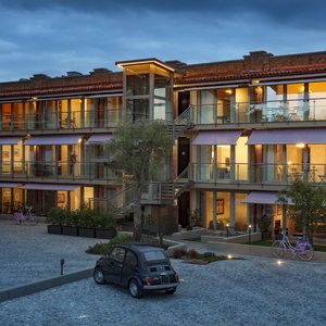 The old wine cellar of the 1934 transformed in modern apartments, in the center of Alba.
