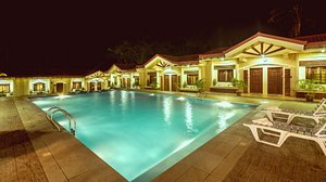 Rema Tourist Inn in Palawan Island, image may contain: Resort, Hotel, Villa, Pool