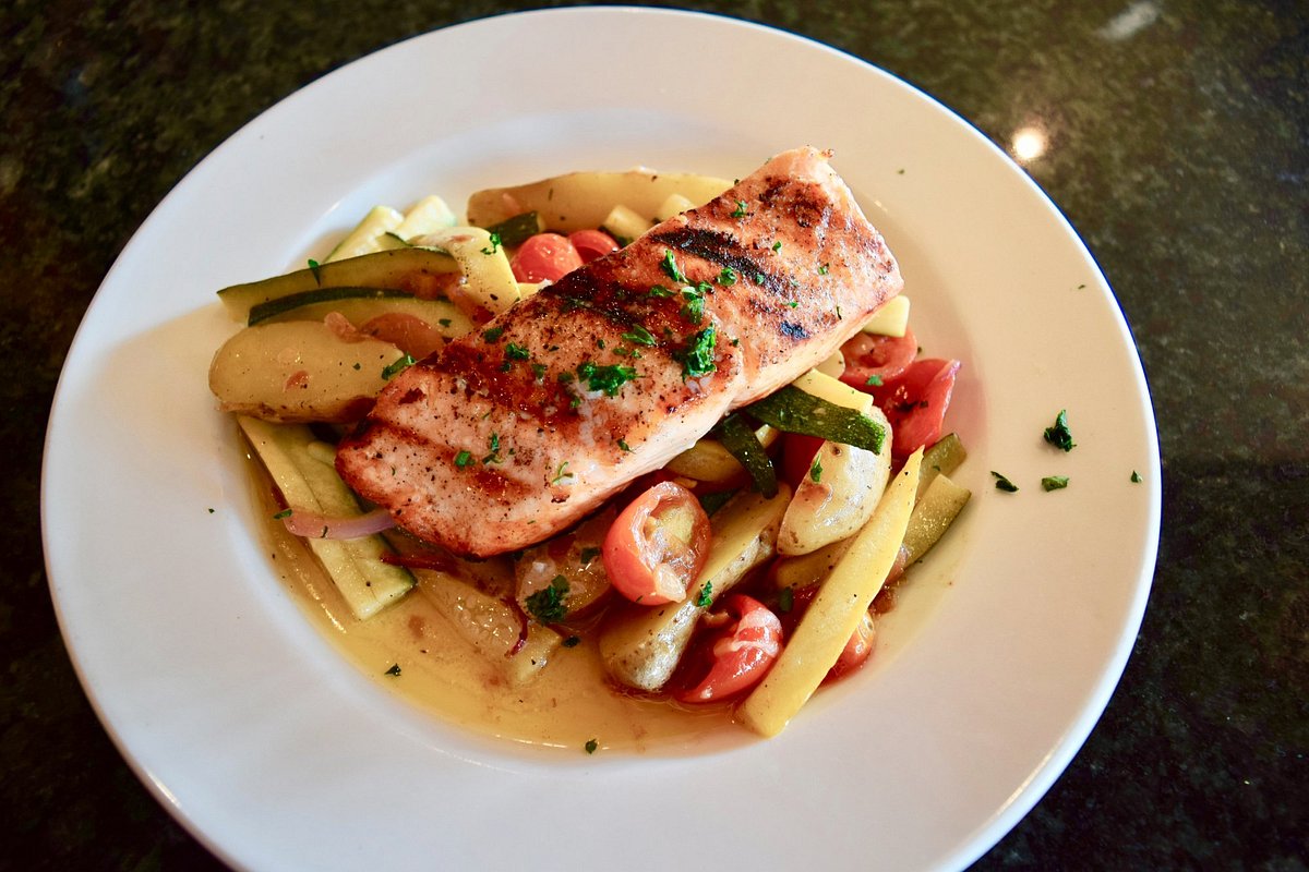 https://dynamic-media-cdn.tripadvisor.com/media/photo-o/0f/7a/d7/12/grilled-salmon-entree.jpg?w=1200&h=-1&s=1