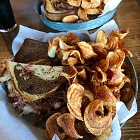 Wonderful Rueben Sandwich on marbled rye bread with homemade curly potato chips!