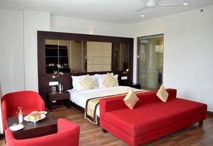 Mumbai House in Udaipur, image may contain: Furniture, Plate, Home Decor, Couch