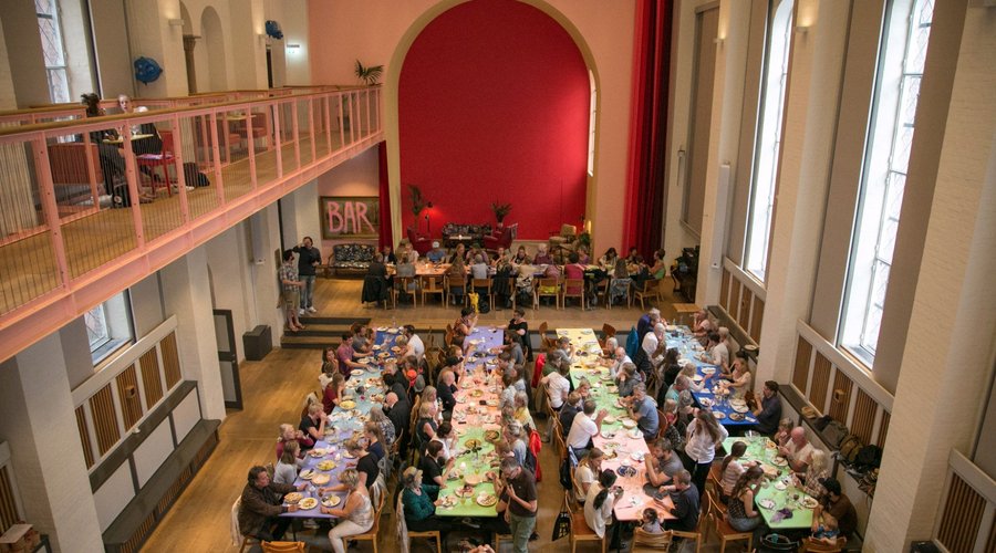 Community dinner. Every night we eat together at 6 pm. Tickets are sold from 5 pm and costs 50 d