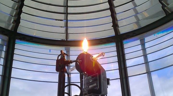 Inside the Blsck Lighthouse the lens that keeps the light running