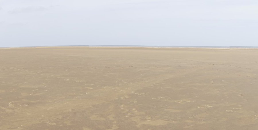 Empty beach - that's SWMBO and our dog in the distance. Midday on a glorious day in June.