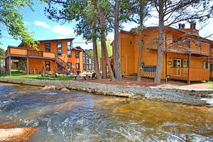 Murphy's River Lodge in Estes Park, image may contain: Neighborhood, Villa, Hotel, Resort