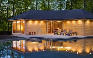 Hotel Debowy Biowellness & SPA in Bielawa, image may contain: Interior Design, Housing, House, Backyard