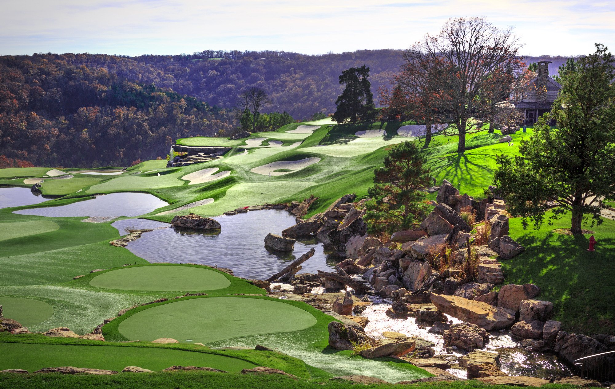 top of the rock golf course        
        <figure class=