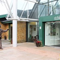 The entrance to The Stables, a statue of founder Sir John Dankworth pointing the way!