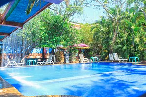 Rancho Estero y Mar in San Luis Talpa, image may contain: Hotel, Resort, Chair, Pool