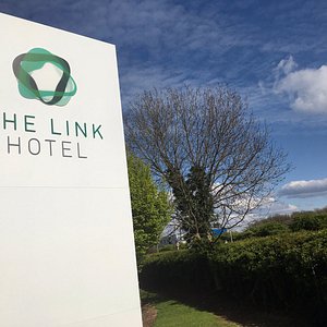 The Link Hotel in Loughborough, image may contain: Hedge, Advertisement, Logo, Grass