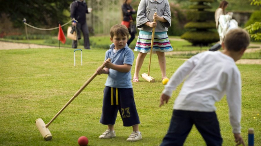 Families enjoying the lawn games.