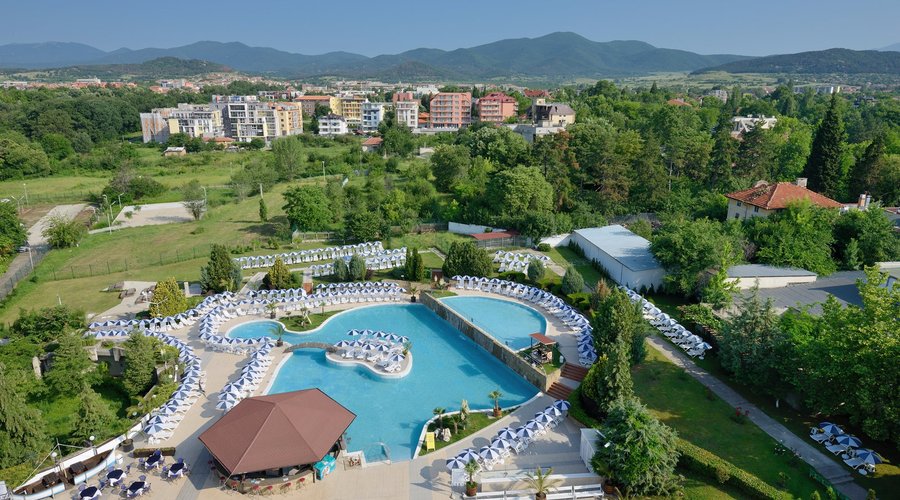 Outdoor swimming pool and children's pool with mineral water & water bar in the beautiful garden