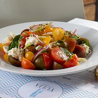 Caprese salad and anchovy- Fresh mozzarella, multicolored cherry tomatoes, red onions, toasted