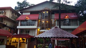 Hotel Kumar Plaza in Matheran, image may contain: Hotel, Resort, Neighborhood, Person