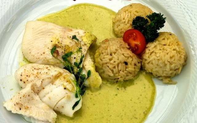 Poached fish with risotto balls
