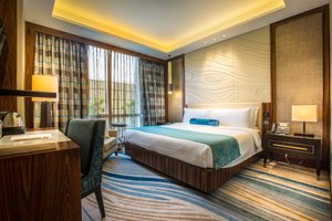 Winford Manila Resort & Casino in Luzon, image may contain: Hotel, Home Decor, Lamp, Interior Design