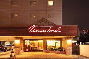 UNWIND HOTEL & BAR SAPPORO in Sapporo, image may contain: Lighting, Hotel, Night, Gate