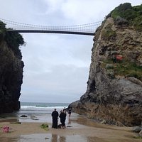 Bridge above house in the sea - low tide