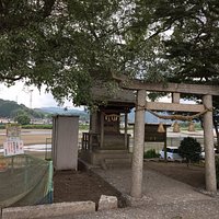 Shrine near the tree, just like the one in the Totoro movie