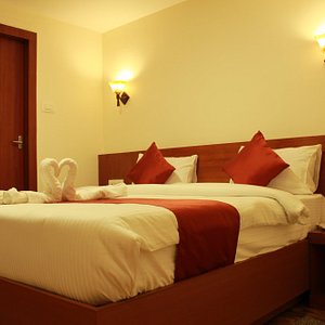 Comfortable Queen sized beds in our Standard rooms.