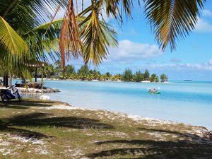 Aitutaki Village in Aitutaki, image may contain: Summer, Land, Sea, Tropical