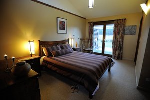 Forest Walks Lodge in Jackeys Marsh, image may contain: Bedroom, Furniture, Bed, Indoors