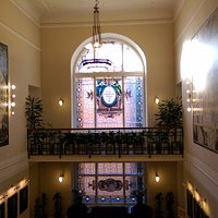 Lovely staircase with geographical artworks.