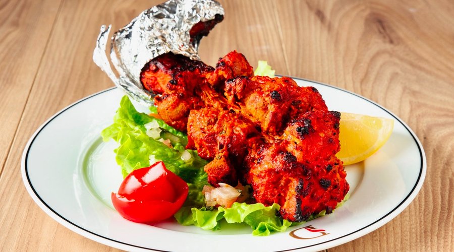 Bara Kabab Spécialité du Chef: Petit jarret d’agneau entier, présenté sur son os grillé