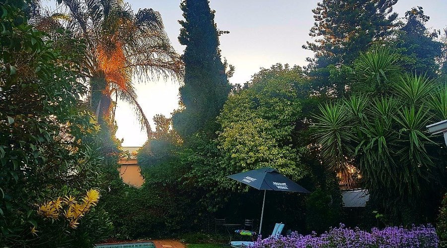 Beautiful view of the pool and garden from the Thulani twin and double