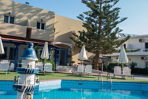 Fragiskos Hotel in Crete, image may contain: Hotel, Resort, Villa, Chair