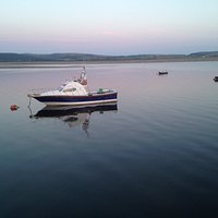 A calm evening sitting on a bench at the quay side