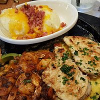 Sizzling Chicken and Shrimp with loaded mashed potatoes.