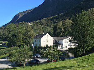 Hotel Aak in Andalsnes, image may contain: Neighborhood, Slope, Vegetation, Grass