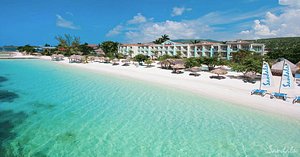 Sandals Montego Bay in Jamaica, image may contain: Hotel, Resort, Waterfront, Sea