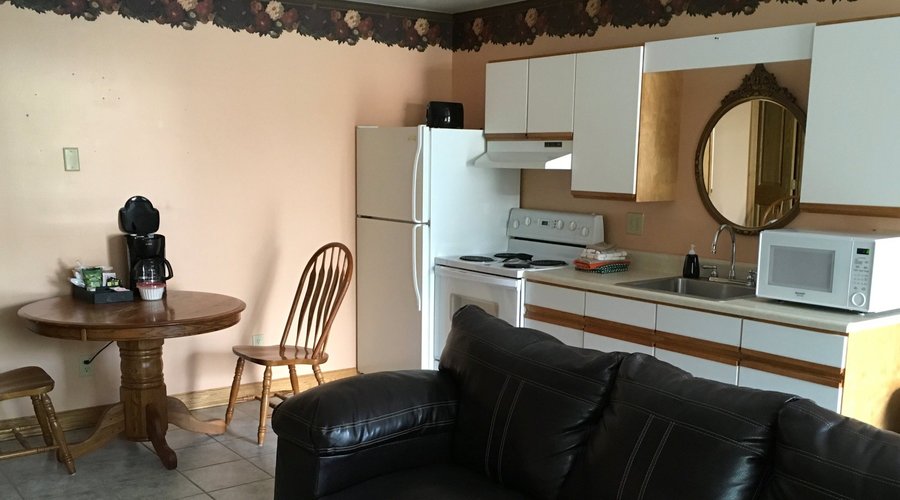 The Blue Spruce Motel has 10 suites set up just like a one bedroom apartment.  Great for long st