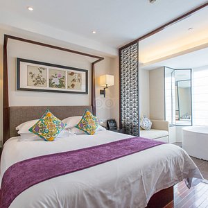 SSAW Boutique Hotel Shanghai Hongkou in Shanghai, image may contain: Home Decor, Bed, Furniture, Bathtub
